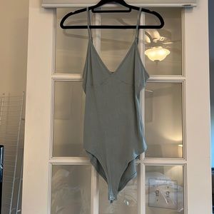 Sage green spaghetti strap bodysuit. Purchased from forever21. Never worn.